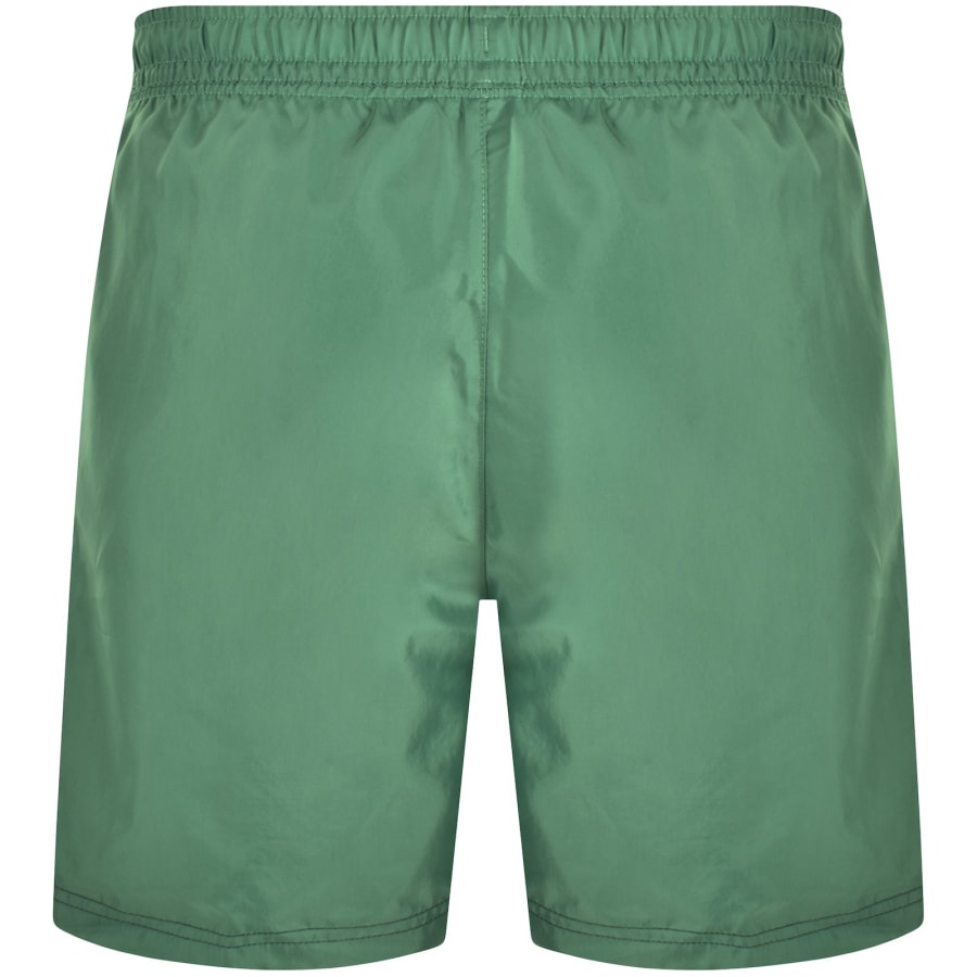 Green and white nike shorts 2025